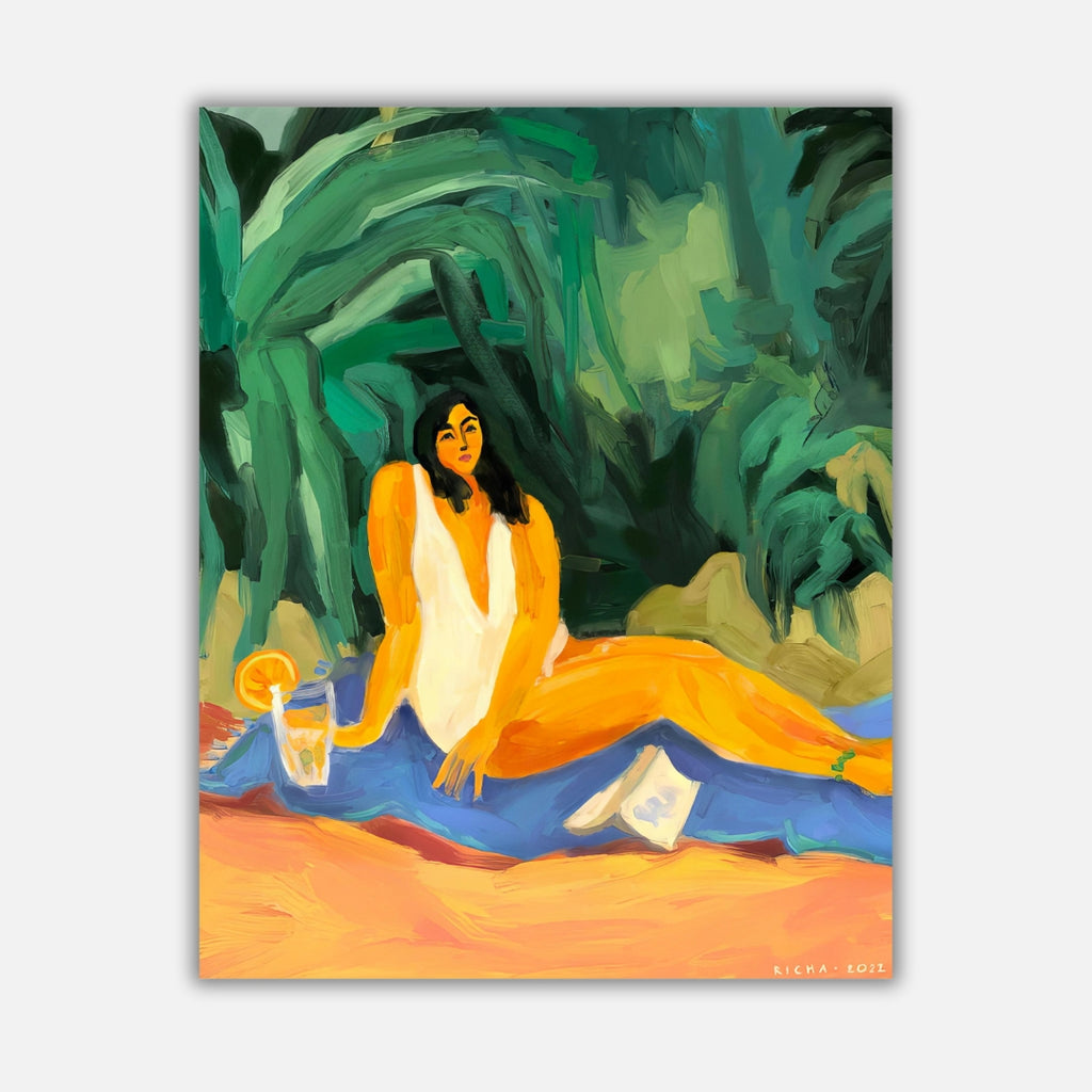 Orange Mint Beach Day  Richa Kashelkar   Painting of an Indian woman relaxing in a bathing suit. Sitting on a blue blanket towel. Green background. Glass with orange in it and a book. 